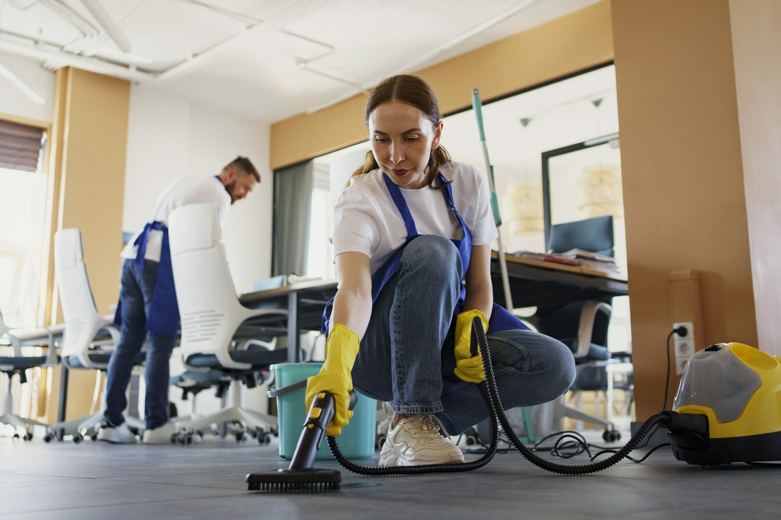 Home Repair 54 professional cleaning service person using vacuum cleaner office scaled