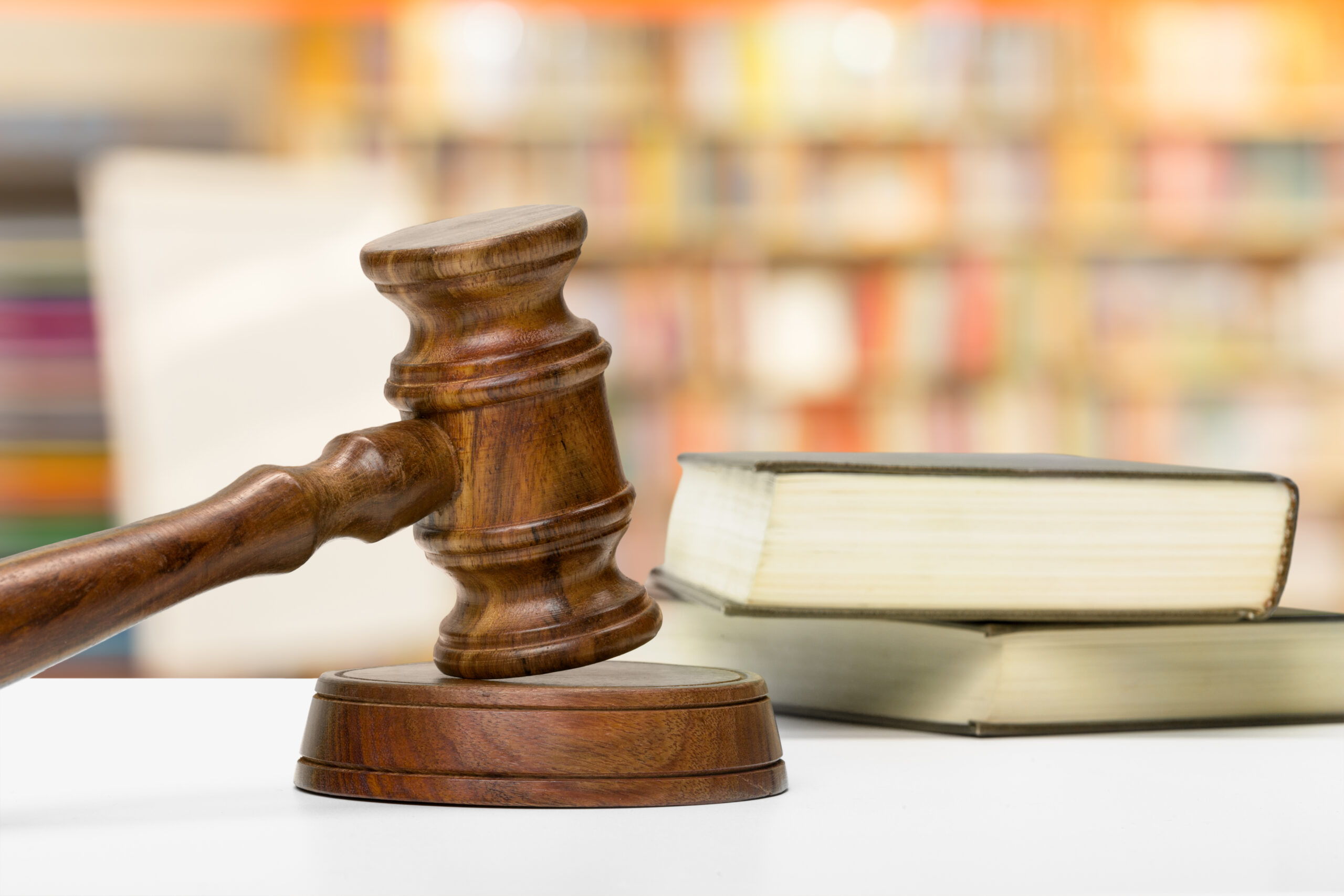 wooden gavel books wooden table scaled